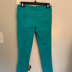 Turquoise low rise skinny jeans